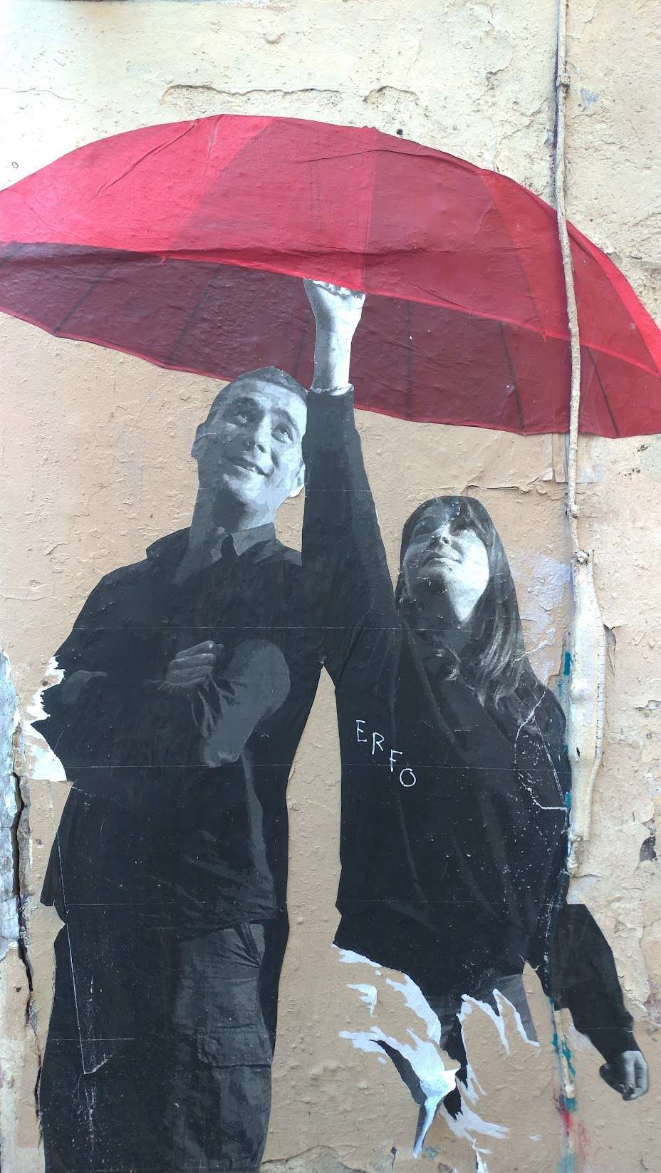 a mural of a man and woman holding an umbrella, French Test for Beginners